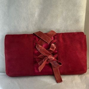 Bordeaux  Red laced up suede/   satin interior clutch bag